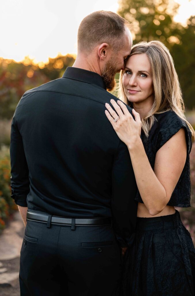 Couple embracing during golden hour at a St. Louis couples photography session